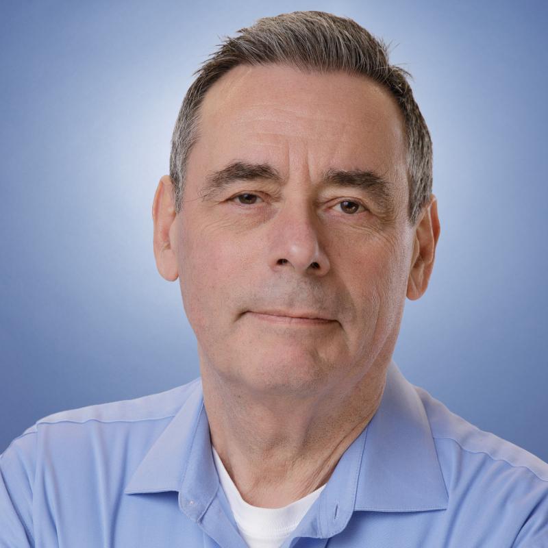 Roland headshot 2026